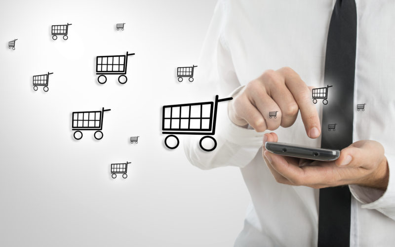 Man using a mobile to shop online